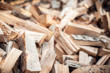 Village life. A pile of chopped firewood