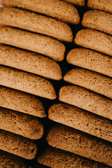 Background with italian almond cookie and almonds on white marble table, food concept with copy space, top view.