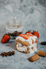 Summer dessert, classic strawberry tirumisu. blue marble surface. copy space