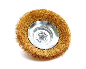 Circular metal wire brush for cleaning isolated on a white background. Wire brush for mechanical cleaning for metal