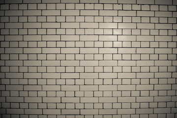 Fototapeta na wymiar Cream brick wall, London, UK