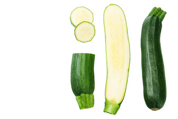 fresh green zucchini with slices isolated on white background. top view