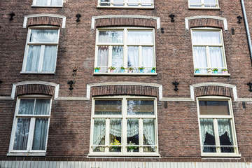 Obraz premium Old classic houses in Amsterdam, Netherlands