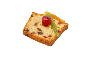 A slice of candied fruits cake with white background