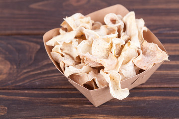 Dried dehydrated sweet potato chips. Delicious organic eco-friendly snack for the whole family. Healthy eating concept.