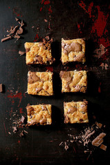 Trend baking Brookies chocolate brownies and cookies homemade cake sliced by squares in row,...