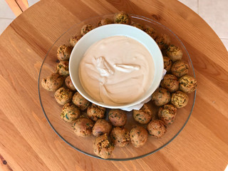 Fresh Mini Falafel Balls with Tahini Hummus Sauce Tahin / Small Roasted Chickpeas for Healthy Appetizer Snacks.