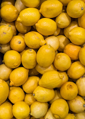 Pile of fresh lemons at a grocery store
