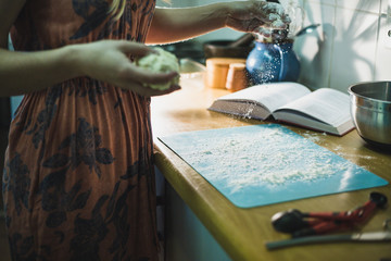 Dusting a surface with flour