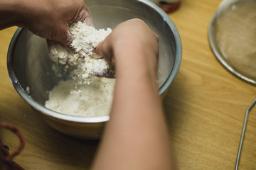 Working butter into flour to make a pastry