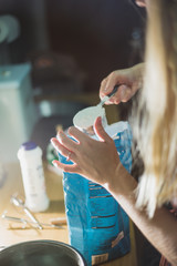 Measuring flour with a measuring cup
