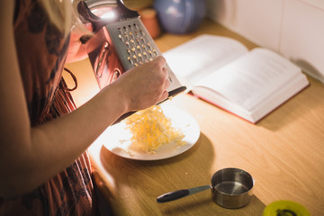 Grating butter with a cheese grater