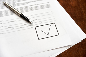 blank document with checkbox and check mark