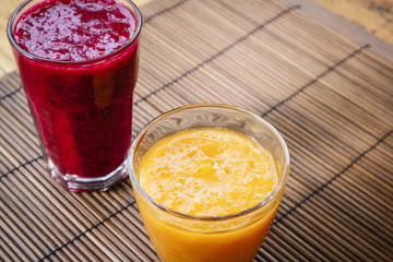 Dragon fruit, papaya and mango smoothies