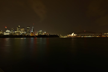 Naklejka na ściany i meble Sydney skyline with Harbour Bridge and Opera House at night