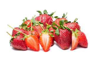 Strawberries with leaves isolated on a white background. Fresh red ripe berry waiting to be eaten.