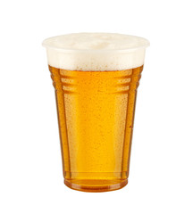 beer with foam in glass te background