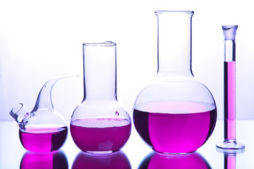 laboratory glassware with colorful chemical