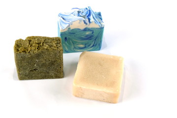 Handmade natural herbal soap Art on soap cubes on a white background
