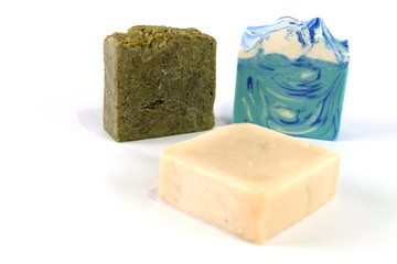 Handmade natural herbal soap Art on soap cubes on a white background