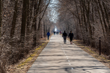 People exercising on trails during Coronavirus pandemic.