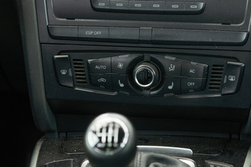 View from inside a car on a part of dashboard