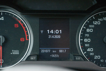 View from inside a car on a part of dashboard
