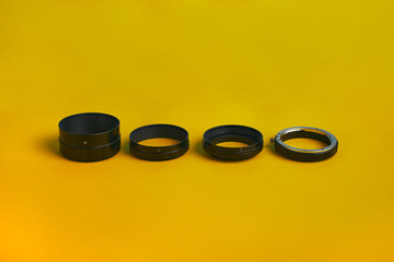 kit of macro rings isolated on colorfull orange background
