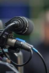 Fototapeta na wymiar Camera microphone outdoors, when shooting a report