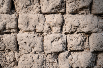 Wall from mud bricks or clay bricks