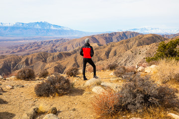 Hiker hiking in the mountains with beautiful landscape views