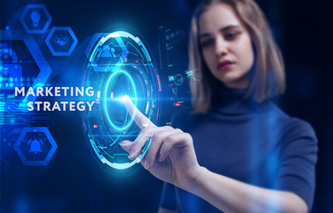 Business, Technology, Internet and network concept. Young businessman working on a virtual screen of the future and sees the inscription: marketing strategy