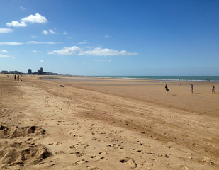 View from the sandy beach in sunny day on the Ostende city, Belgium.