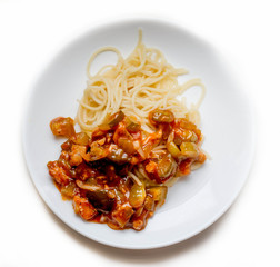 Pasta in a plate on a white background