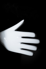White mannequin hand. Palm down