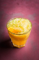 Old fashioned orange cocktail on rustic background. Selective focus. Shallow depth of field.