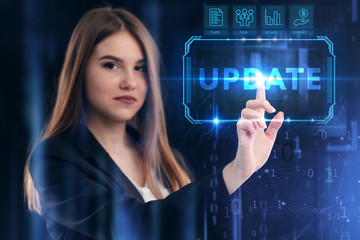 Business, Technology, Internet and network concept. Young businessman working on a virtual screen of the future and sees the inscription: Update