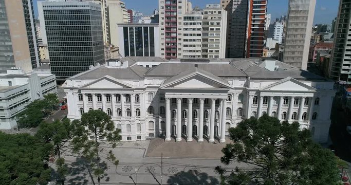 Drone shot of a square with a university building