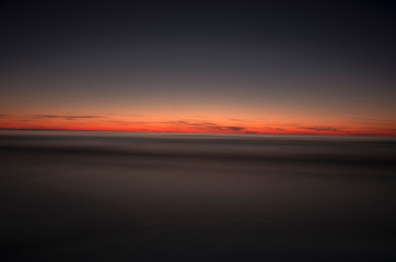 sunset over calm Baltic sea