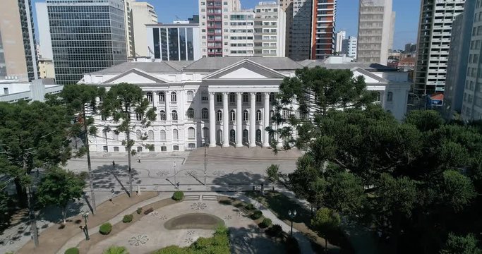 Drone shot of a square with a university building