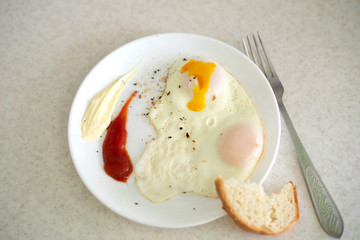 Scrambled eggs on a white plate