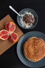 Nutritious breakfast with pancakes and cottage cheese