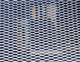 White metal staircase grid background. Metal mesh texture