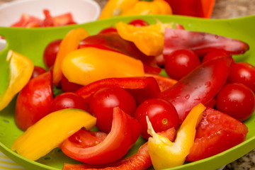 Freshly cut raw vegetables being prepared to be cooked 