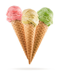 Ice cream cones with different flavors on white background