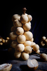 Lansium Parasiticum, Langsat, Duku, Longkong, or tropical fruit Lanzones in Asia. Piles of tropical fresh fruit are called Langsat.