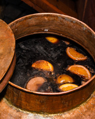 Mulled wine in large pot for sale during Christmas market