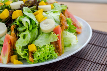 Arugula salad with heart of palm and juice close up