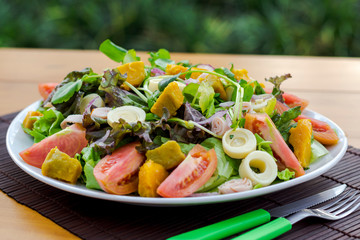 Salad with rocket, pumpkin and heart of palm