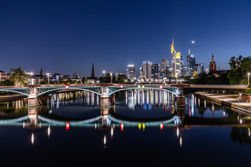 Fototapeta na wymiar Moon over Frankfurt skyline at night 
